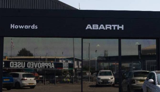 Abarth dealership image with cars