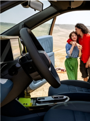a couple walking up to a car