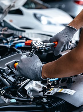 person fixing engine