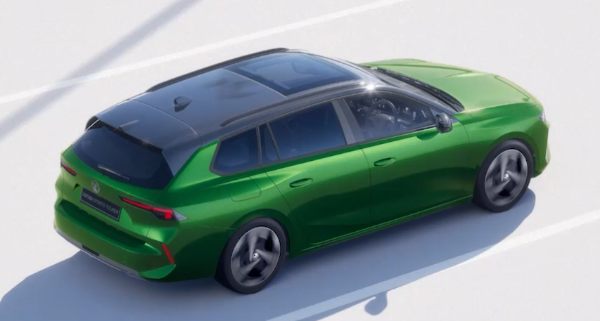 Green estate car with a black roof viewed from above.