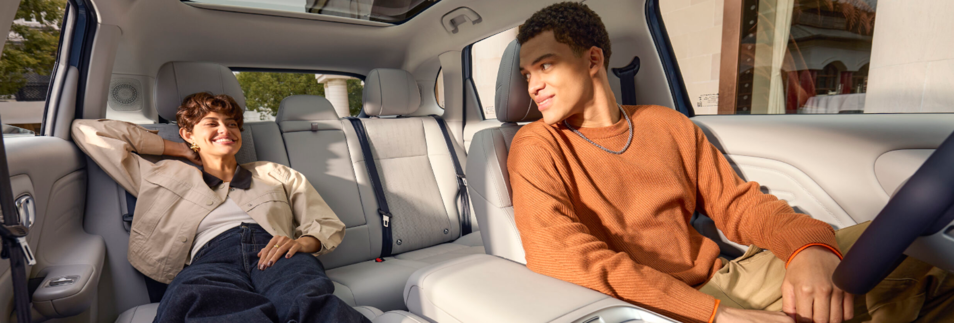two people in the inside of the car