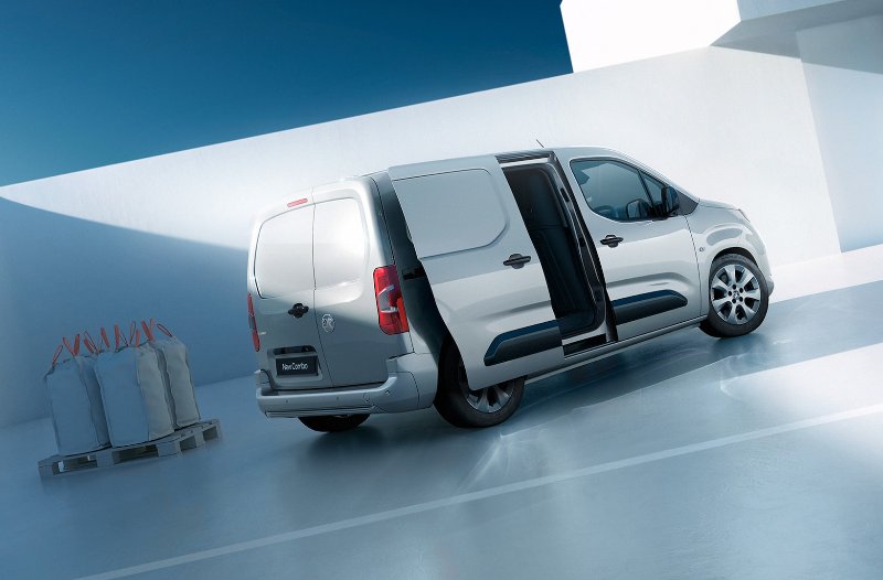 van sliding door open with bags in the back