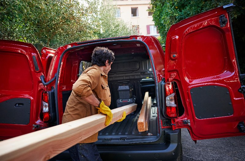 man filling up the van