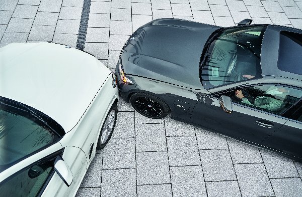 Two cars involved in a minor collision, viewed from above.