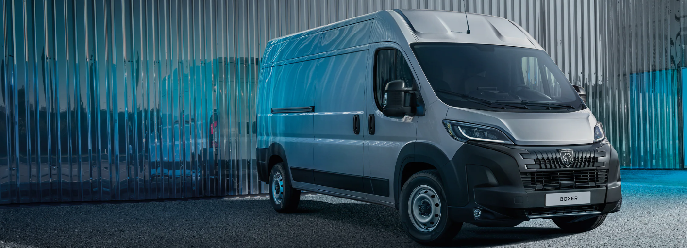 van parked outside of metal building