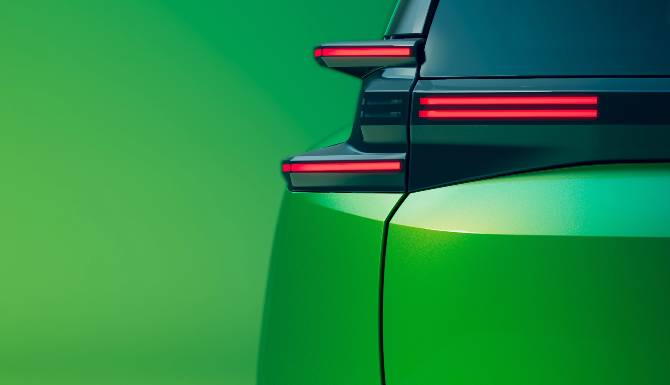 close up of green cars rear headlights