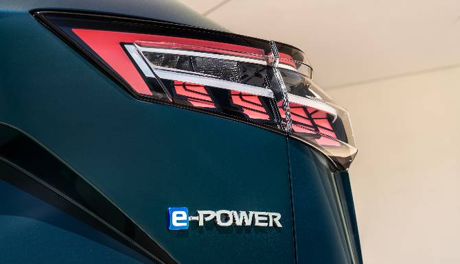 Close-up of rear car light with e-Power badge.