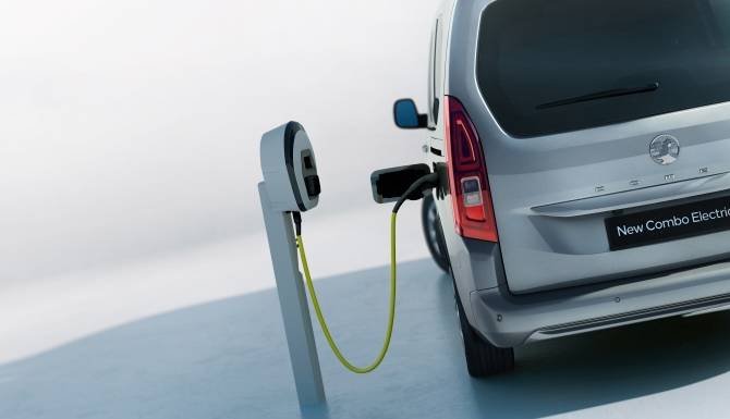 Van plugged into the electric charger