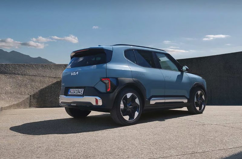 Blue SUV parked outdoors, viewed from the rear-left side.