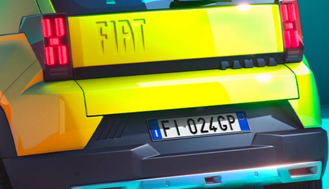 fiat grande panda in yellow from back