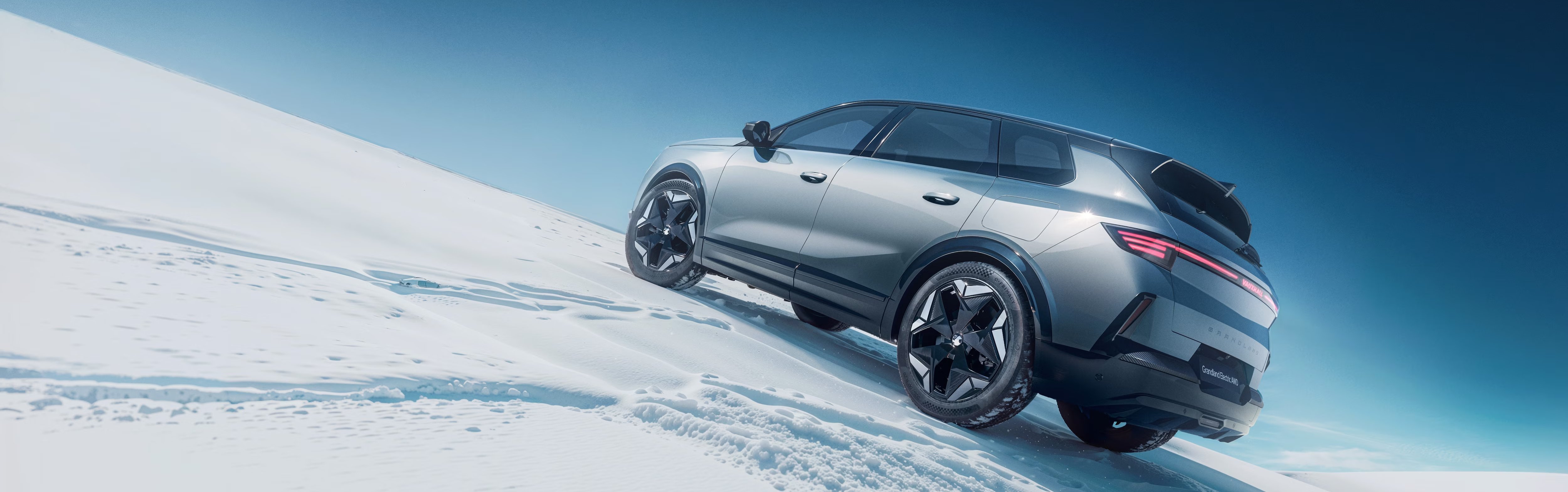 CAR ON A SNOWY ROAD