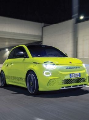 green Abarth 500e coming out of a tunnel