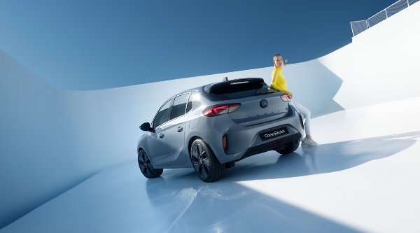 person standing next to car
