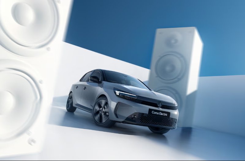 car next to speakers
