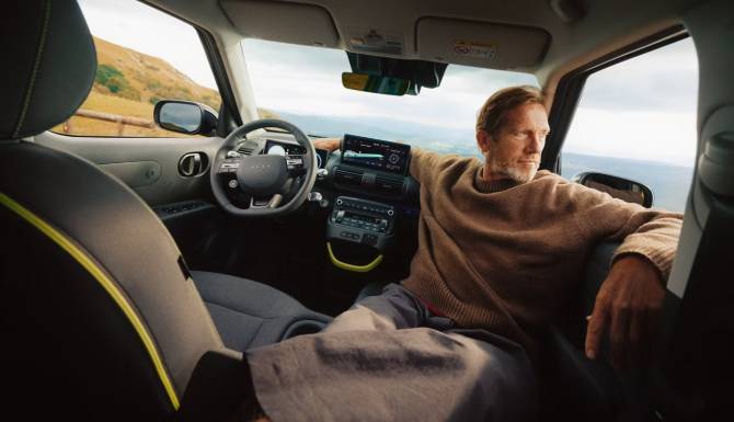 hyundai inster cross from the inside with man inside