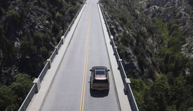 santa fe driving on bridge