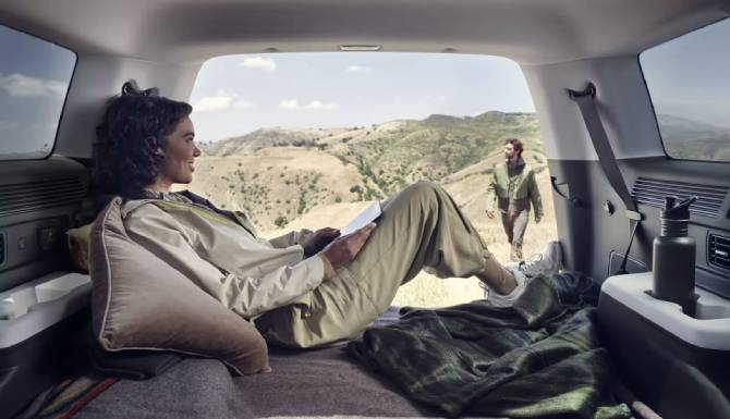 woman sat in the back of santa fe