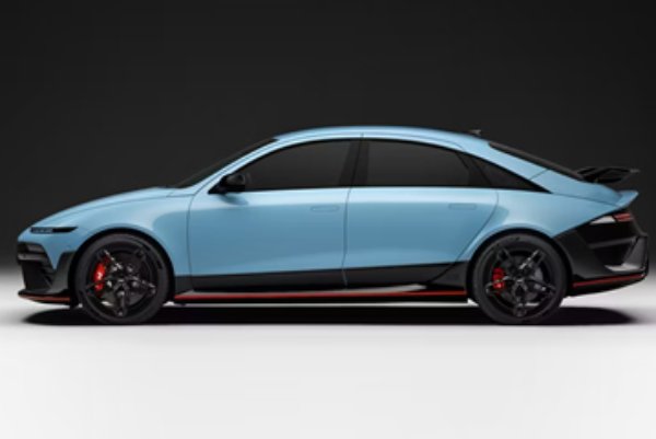 Blue and black hatchback car viewed from the side.