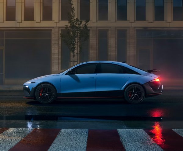 car parked in the street at night time