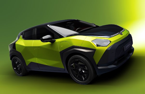 Green and black SUV with a modern design viewed from the front side.