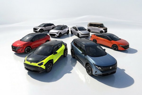 Various cars in different colours parked in a semi-circle formation.