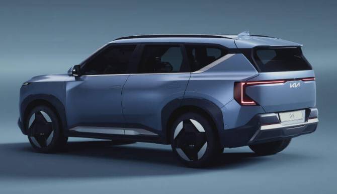 Kia EV5 in blue from rear and side