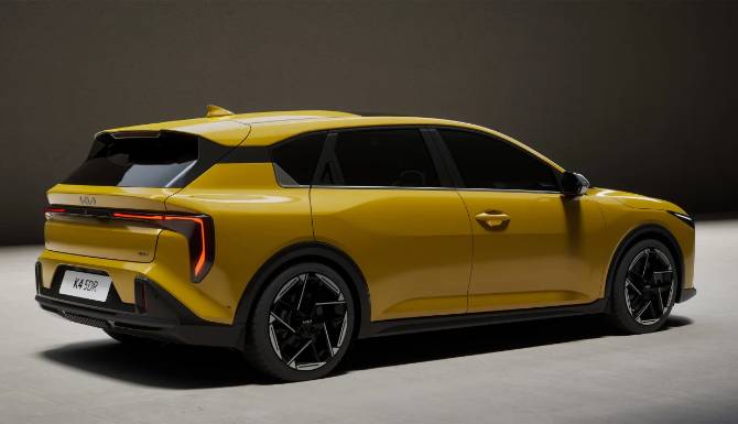 Yellow modern hatchback car, rear-side view.