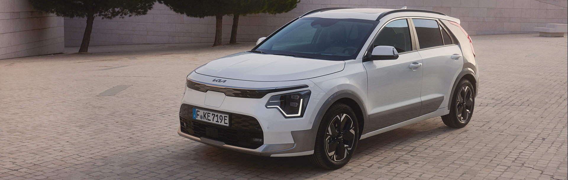 A white electric SUV parked outdoors
