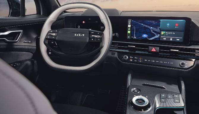 kia sportage interior with steering wheel and screen
