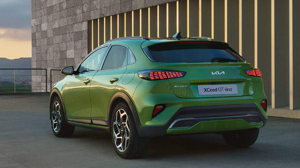 Green Kia XCeed GT-Line car parked outdoors.