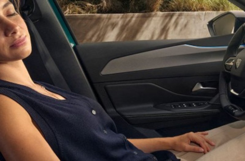 Lady sat in the drivers seat of the new 308