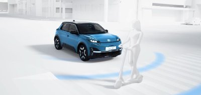 Blue car using a detection system to recognise a figure on a scooter crossing its path.