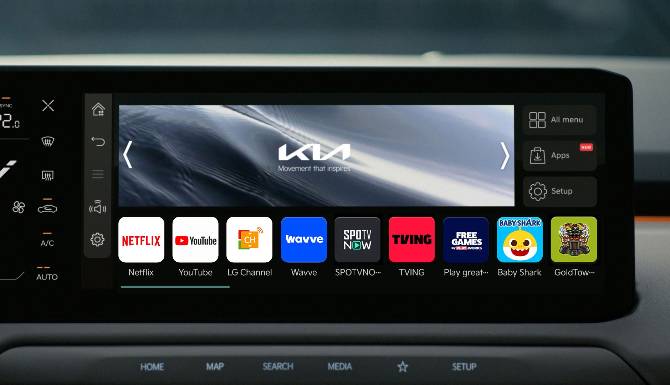 Car infotainment screen showing various app icons, including Netflix and YouTube.