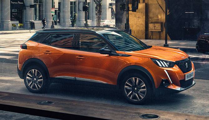 Peugeot 2008 SUV Orange On The Road 1