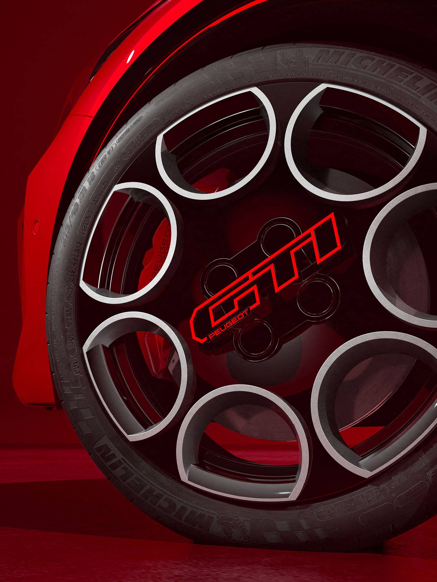 peugeot gti alloy wheels with red details