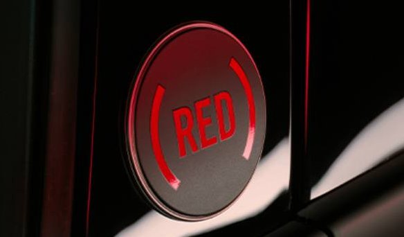 CLOSE-UP OF RED BADGE