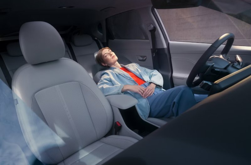 Person laying down in the car