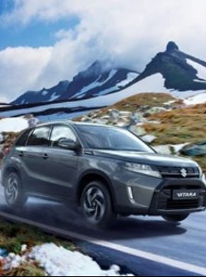 Suzuki Vitara driving through mountains