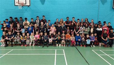 Howards marks 20 years of support with the Uphill Junior Badminton Club