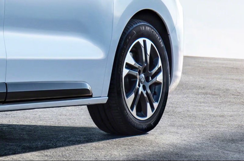 closeup of the wheel and tyre of a car