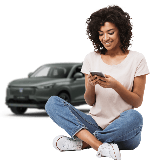 Woman on phone with Honda HR-V behind