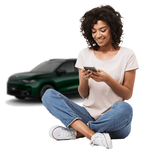 Woman on phone with Leapmotor C10 behind