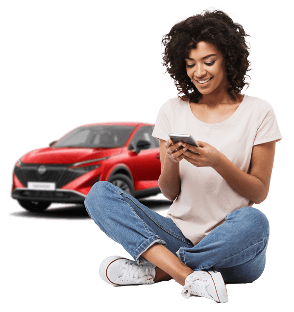 Woman on phone with Nissan Qashqai behind