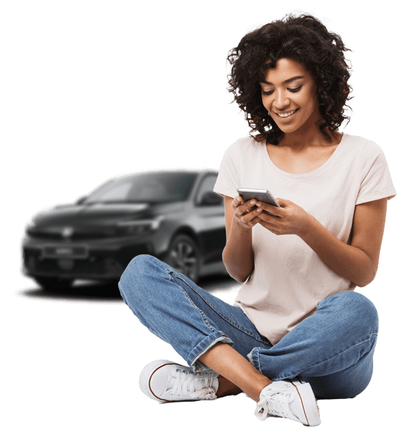 Woman on phone with Vauxhall Corsa behind