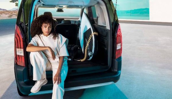 Women sat in the boot space of the e-rifter
